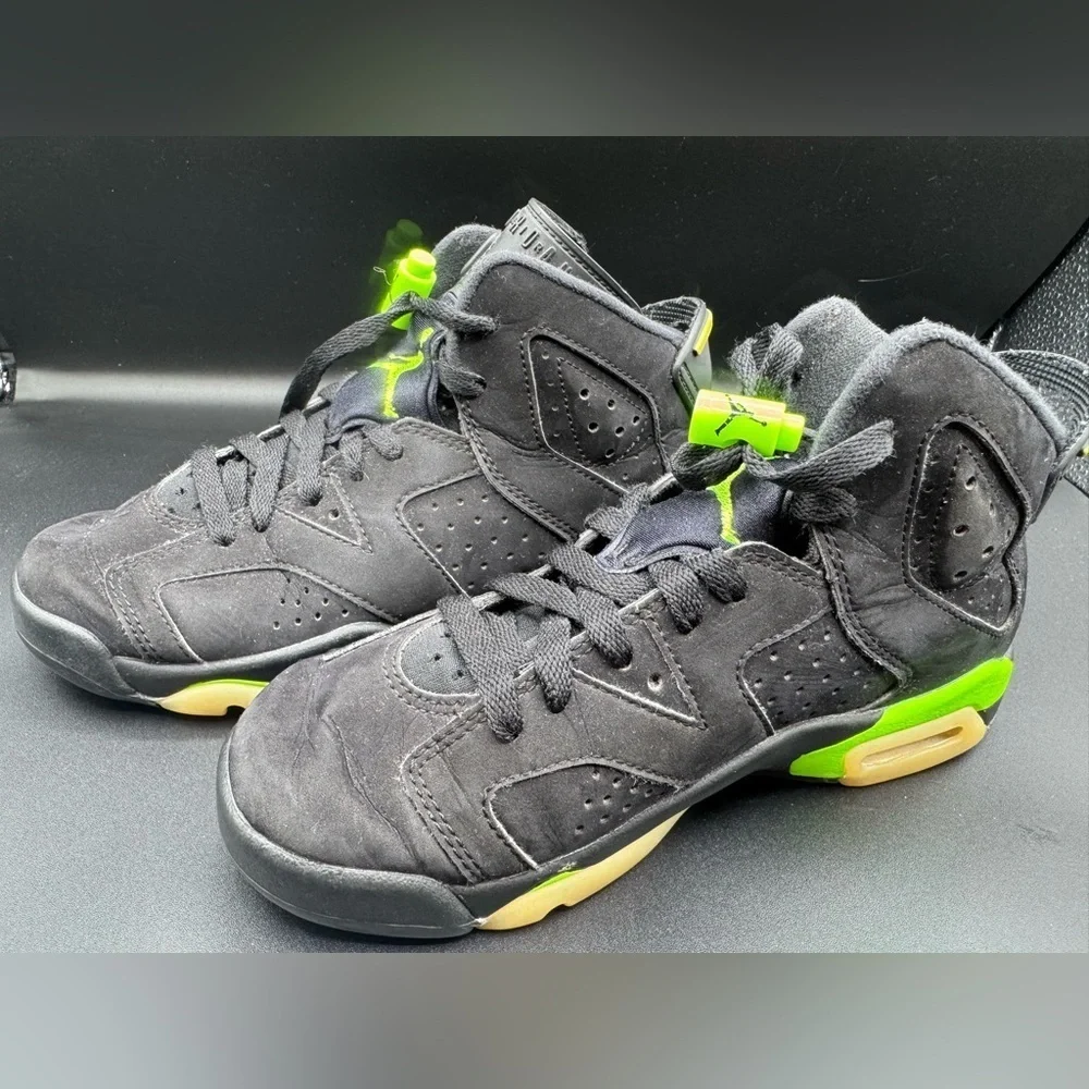 Jordan Black and Green Sneakers with Air Unit and Perforated Panels